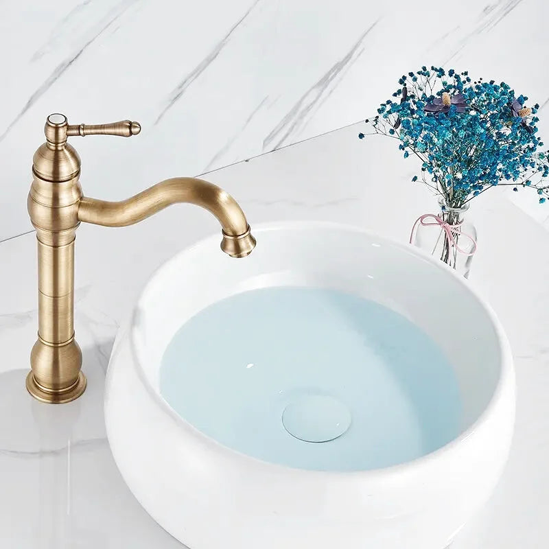 Ibis antique brass bathroom faucet – vintage-inspired design with a warm brass finish, featuring dual handles and a timeless elegance for classic bathroom décor.