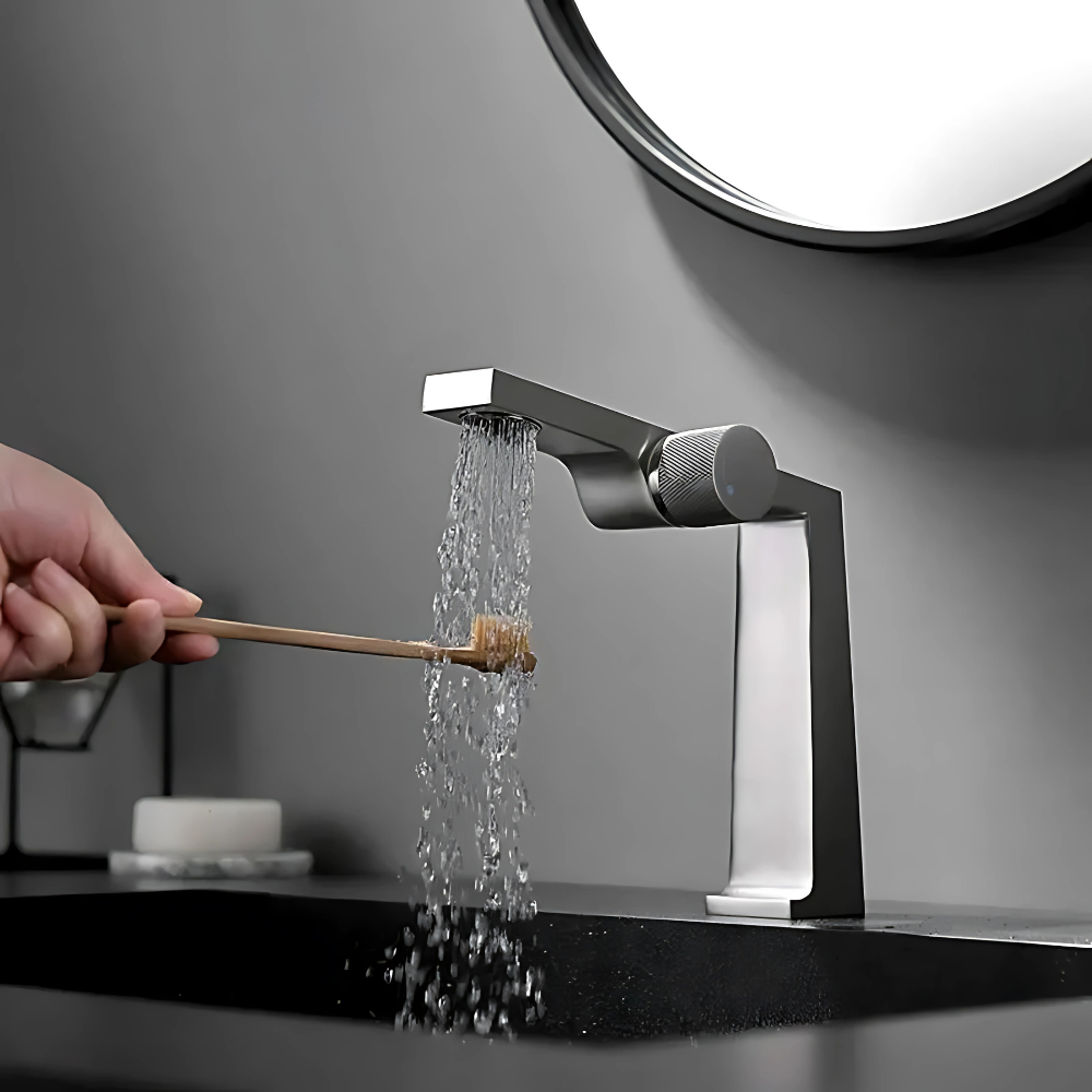 Nona luxury waterfall bathroom faucet – elegant and modern design with a wide spout for a smooth, cascading water flow, adding a spa-like touch to any bathroom.