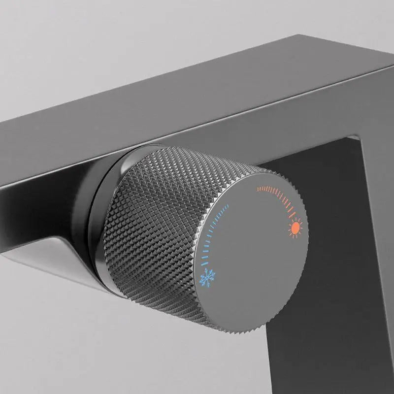 Nona luxury waterfall bathroom faucet – elegant and modern design with a wide spout for a smooth, cascading water flow, adding a spa-like touch to any bathroom.