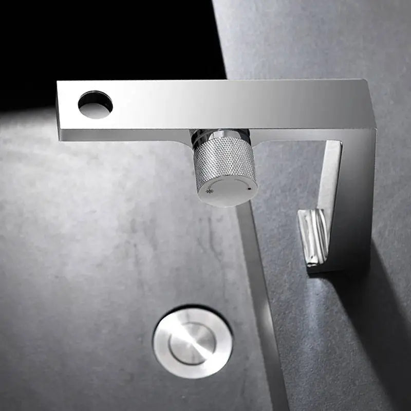 Nona luxury waterfall bathroom faucet – elegant and modern design with a wide spout for a smooth, cascading water flow, adding a spa-like touch to any bathroom.