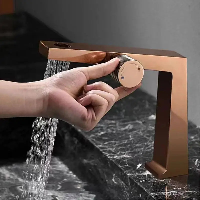 Nona luxury waterfall bathroom faucet – elegant and modern design with a wide spout for a smooth, cascading water flow, adding a spa-like touch to any bathroom.
