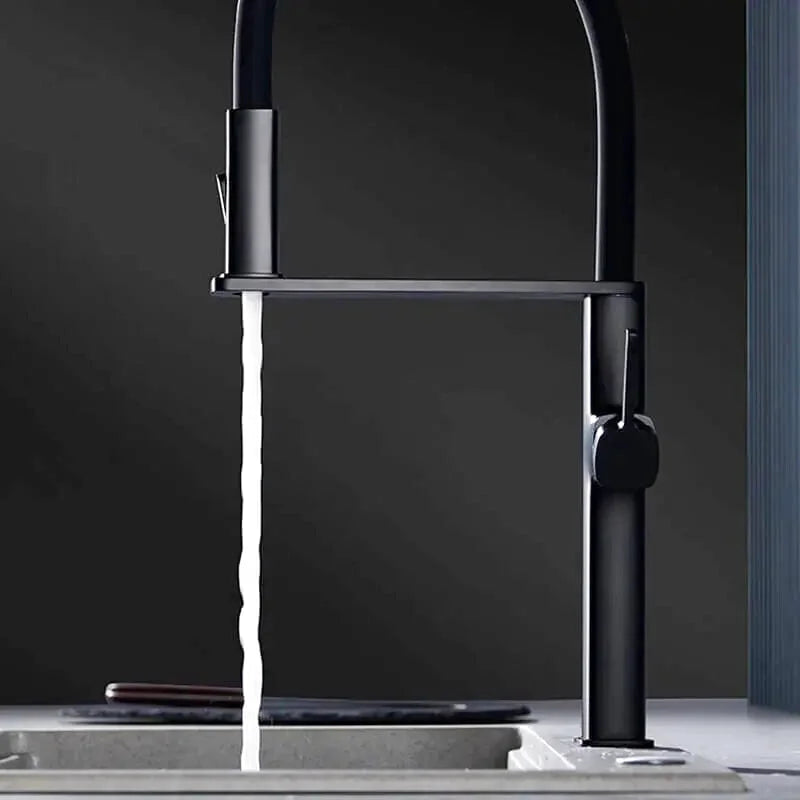 Aria matte black kitchen faucet with pull-out sprayer – modern and stylish design featuring a retractable spray head for enhanced flexibility and convenience in any kitchen.