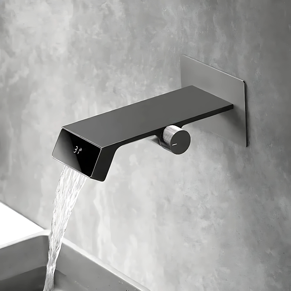 Modern LED waterfall bathroom faucet – sleek and contemporary design with a wide spout for a smooth cascading flow, featuring built-in LED lights that change color with water temperature for a luxurious touch.