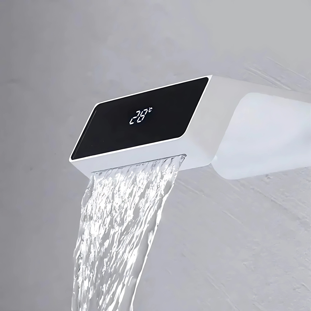 Modern LED waterfall bathroom faucet – sleek and contemporary design with a wide spout for a smooth cascading flow, featuring built-in LED lights that change color with water temperature for a luxurious touch.