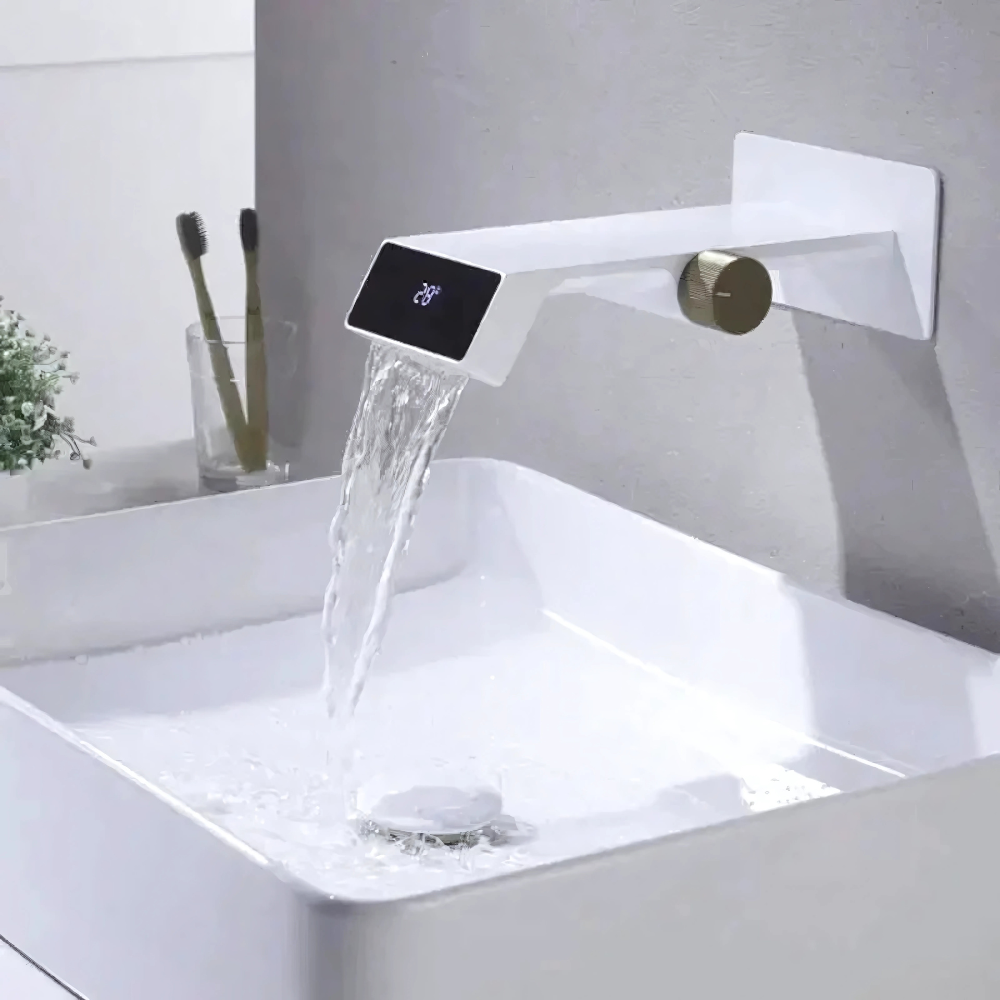 Modern LED waterfall bathroom faucet – sleek and contemporary design with a wide spout for a smooth cascading flow, featuring built-in LED lights that change color with water temperature for a luxurious touch.