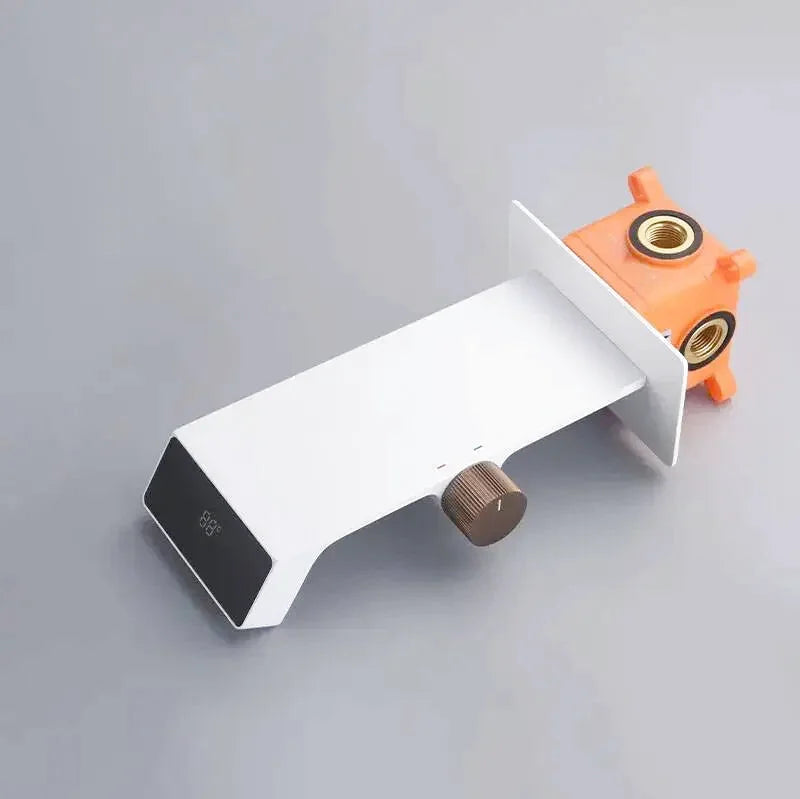 Modern LED waterfall bathroom faucet – sleek and contemporary design with a wide spout for a smooth cascading flow, featuring built-in LED lights that change color with water temperature for a luxurious touch.