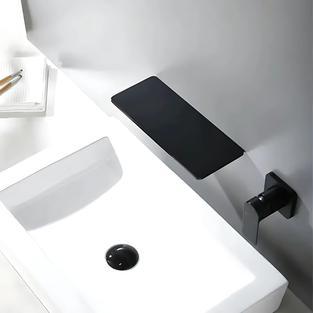 Rima waterfall bathtub faucet – elegant and modern design with a wide spout for a smooth, cascading water flow, creating a luxurious spa-like bathing experience.