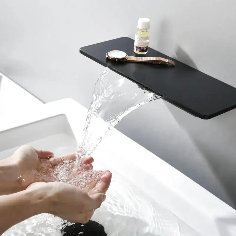 Rima waterfall bathtub faucet – elegant and modern design with a wide spout for a smooth, cascading water flow, creating a luxurious spa-like bathing experience.