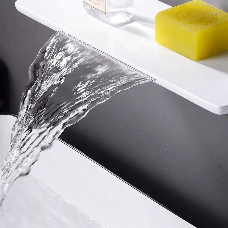 Rima waterfall bathtub faucet – elegant and modern design with a wide spout for a smooth, cascading water flow, creating a luxurious spa-like bathing experience.