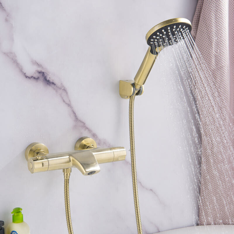 Luna shower system – elegant thermostatic bathtub faucet with a rainfall showerhead and handheld sprayer, offering precise temperature control for a spa-like bathing experience.